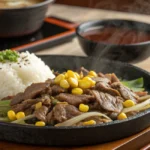 Sizzling hotplate of Pepper Lunch with beef and rice